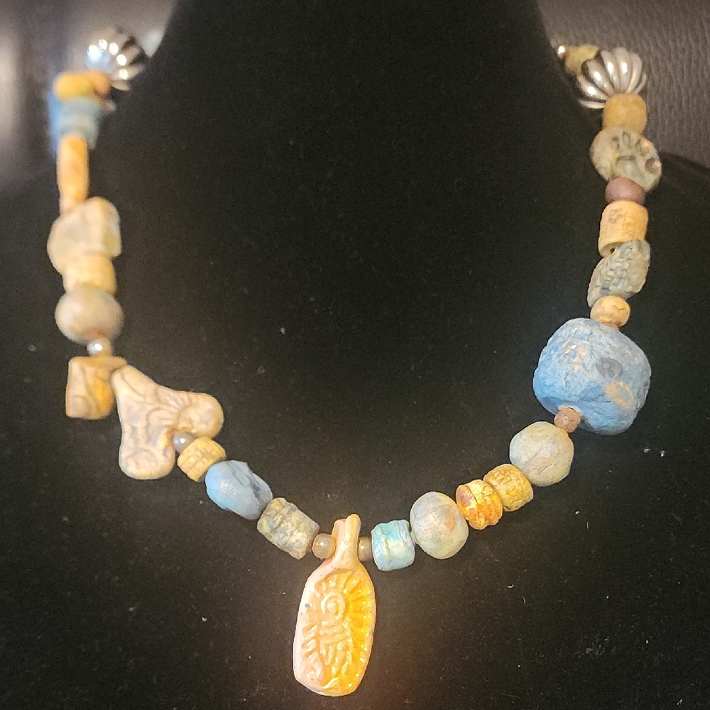 Handcrafted Beaded Necklace with Blue and Yellow Accents